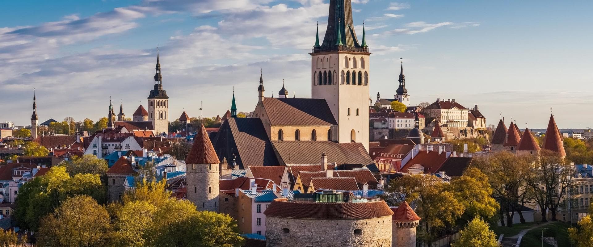 Photo of Tallinn city. Old buildings made of brick.