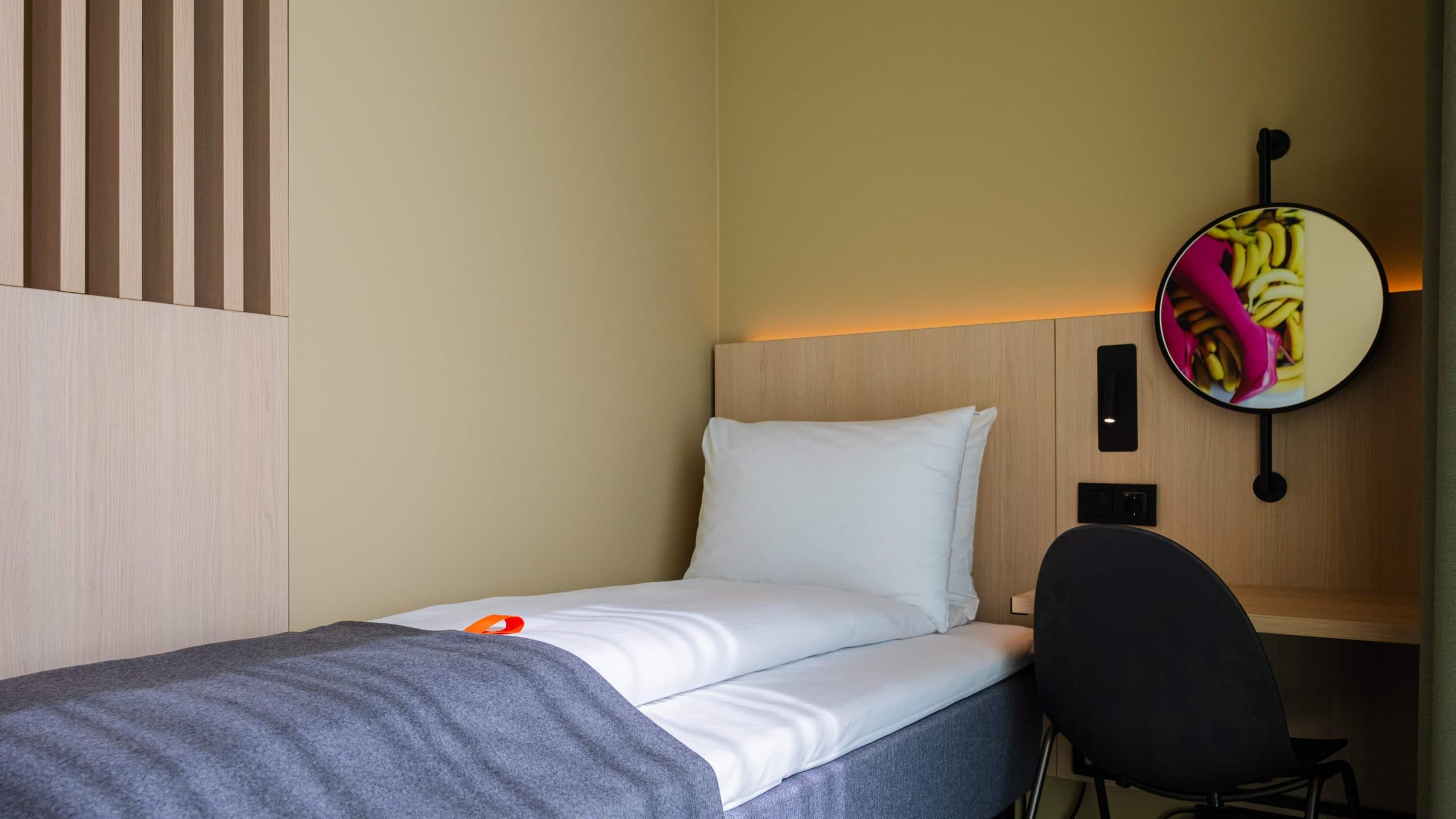 Picture of bed and desk in single room at Citybox Kristiansand